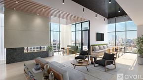 Chicago apartment for rent - A modern living room with a large window overlooking the city.