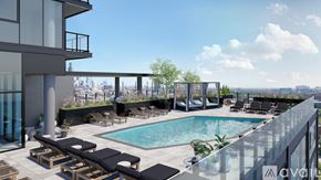 Chicago apartment for rent - A rooftop pool area with lounge chairs and a view of the city.