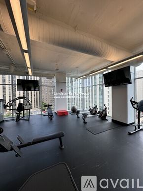Chicago apartment for rent - A gym with a variety of equipment including treadmills, stationary bikes, and weight machines.