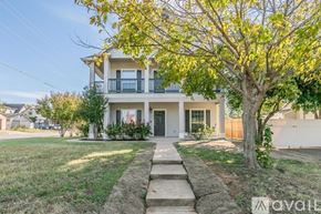 Fort Worth house for rent - A house with a tree in front of it.