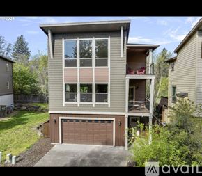 Hood River house for rent - A two-story house with a garage is available for sale.