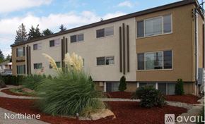 Seattle apartment for rent - A beige building with the word Northlane on it.