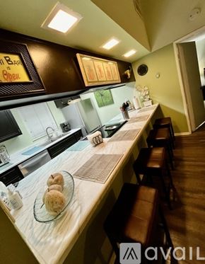 Palm Desert condo for rent - A kitchen with a counter and stools.