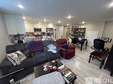 Somerville apartment for rent - A living room with a grey couch and a coffee table in the middle.