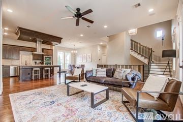 Houston house for rent - A living room with a brown couch and a rug.