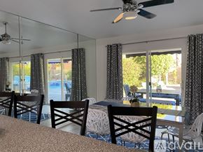 Palm Springs apartment for rent - A dining room with a table and chairs.