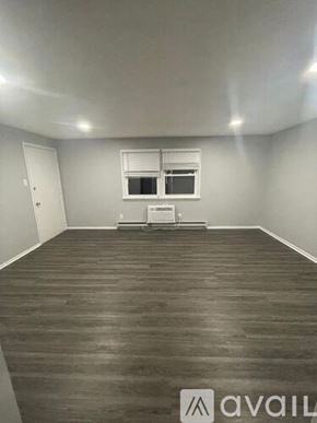 Blackwood apartment for rent - A room with wooden flooring and a window with blinds.