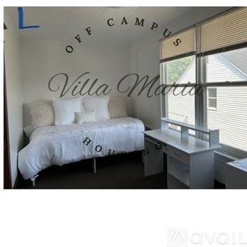 Spokane apartment for rent - A kitchen with a white stove top oven and cabinets.