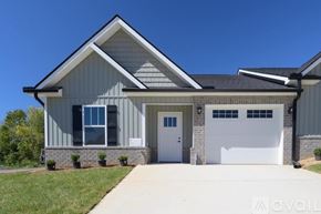 Knoxville townhouse for rent - A modern house with a garage and a driveway.