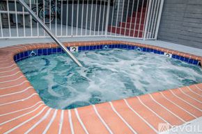 San Diego condo for rent - A hot tub with a metal handle is in the foreground.