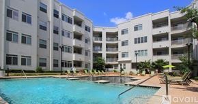 Irving apartment for rent - A large swimming pool in front of apartment buildings.