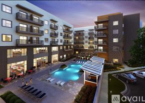 Dallas apartment for rent - A modern apartment complex with a pool and a sun lounger area.