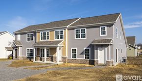 Columbiana house for rent - A two-story house with a grey exterior and white trim is available for purchase.