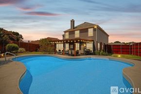Lake Dallas house for rent - A house with a pool in the backyard.