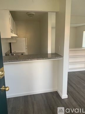 Bakersfield apartment for rent - A kitchen area with a countertop and cabinets.
