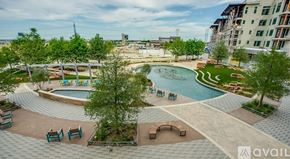 Lewisville apartment for rent - A pool surrounded by trees and chairs with the words "Family Sampler" written on the side.