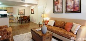 New Braunfels apartment for rent - A living room with a couch, chairs, and a coffee table.