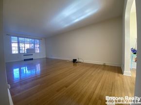 Brookline apartment for rent - A room with wooden flooring and a window letting in natural light.