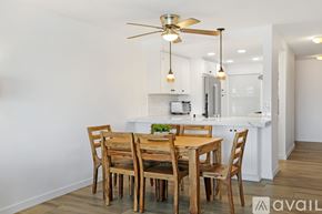 Imperial Beach condo for rent - A dining room with a table and chairs.