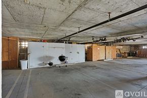 Imperial Beach condo for rent - A large empty warehouse with a BBQ grill in the middle.