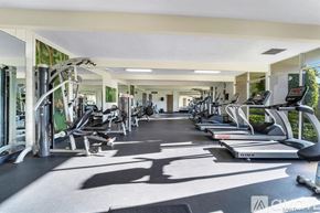 San Diego apartment for rent - A gym with treadmills, elliptical machines, and other cardio equipment.