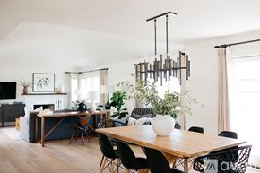 Laguna Beach house for rent - A modern dining room with a wooden table and chairs.