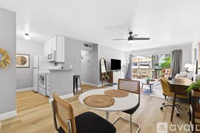 San Diego condo for rent - A dining room with a table and chairs.