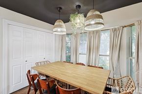 Desoto house for rent - A dining room with a wooden table and chairs.