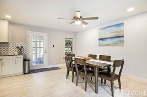 West Palm Beach apartment for rent - A dining room with a table and chairs.
