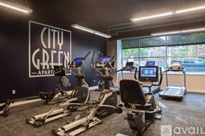 Milwaukee apartment for rent - A gym with a sign that says City Green Apart.