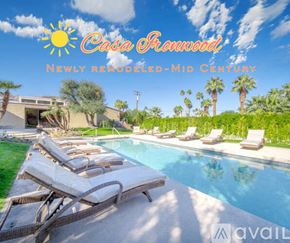 Palm Desert house for rent - A newly remodeled mid-century house with a pool and lounge chairs.