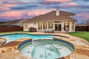 Waxahachie apartment for rent - A house with a pool in the backyard.