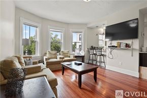 Providence apartment for rent - A living room with a couch, chairs, and a coffee table.