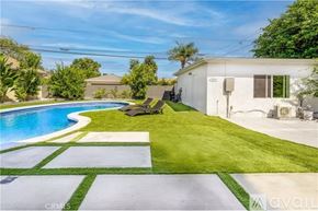 Tarzana house for rent - A house with a pool in the backyard.