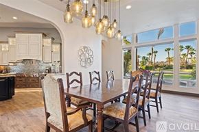 La Quinta house for rent - A dining room with a table set for six.