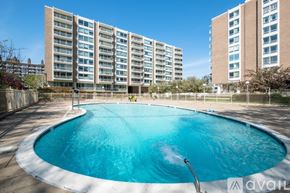 Washington apartment for rent - A swimming pool in front of apartment buildings.