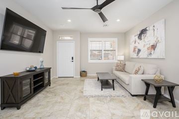 Surprise house for rent - A spacious kitchen with a marble floor and a modern design.