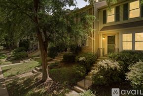 Clifton townhouse for rent - A tree in front of a house with a sign that says "available".