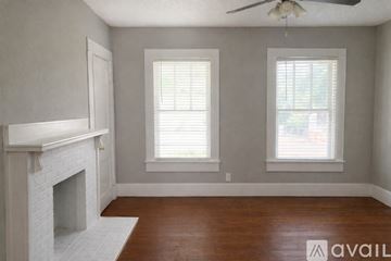 Macon apartment for rent - A kitchen with a sink, cabinets, and a refrigerator.