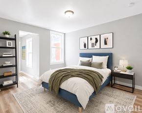 Pittsburgh house for rent - A modern kitchen with wooden floors and stainless steel appliances.
