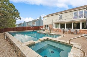 North Richland Hills house for rent - A backyard with a small pool and patio furniture.