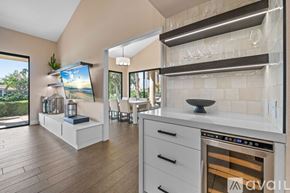 La Quinta house for rent - A modern kitchen with a stainless steel oven and wooden flooring.