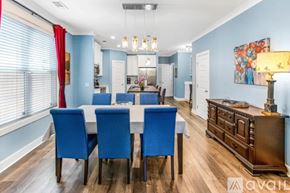 Savannah house for rent - A dining room with a table set for four.