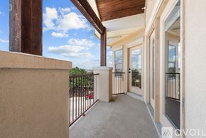 College Station apartment for rent - A balcony with a view of the sky and trees.