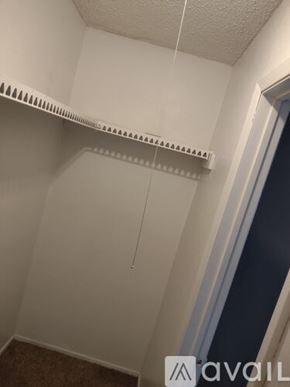 Tyler apartment for rent - A white shelf with a string hanging from it.
