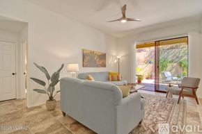 Oro Valley townhouse for rent - A kitchen with wooden cabinets and tile flooring.
