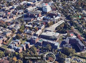 Charlottesville house for rent - An aerial view of a campus with buildings and roads.
