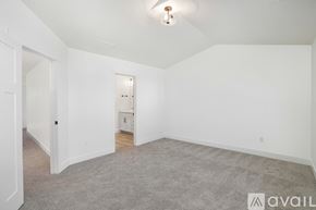 Lehi townhouse for rent - A spacious empty room with a carpeted floor and white walls.