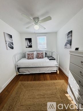 Milford apartment for rent - A kitchen with a black oven and white countertops.