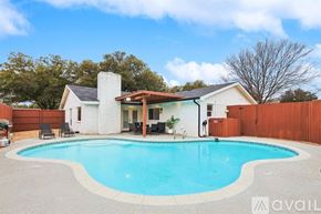 Plano house for rent - A house with a pool in the backyard.